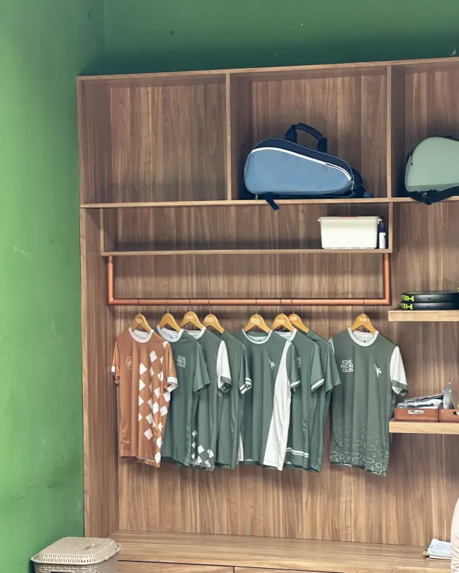 Soul merch shelf with tees and bags