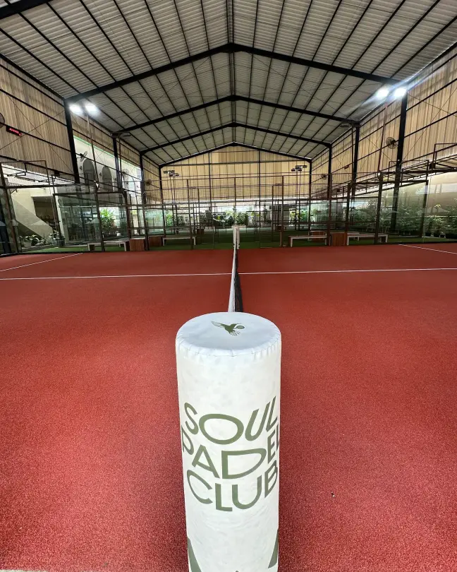 Soul Padel Club net post on terracotta